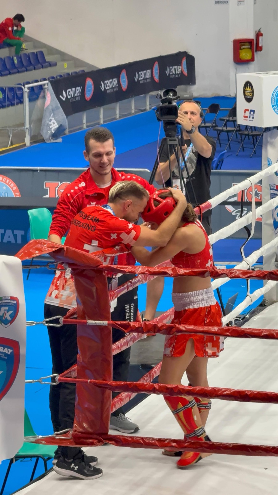 Eva Tschanz with coach in the ring corner